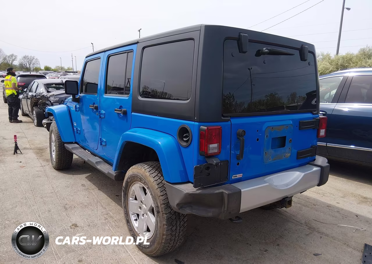 2012 Jeep Wrangler Unlimited Sahara VIN:1C4BJWEGXCL142423 - 3
