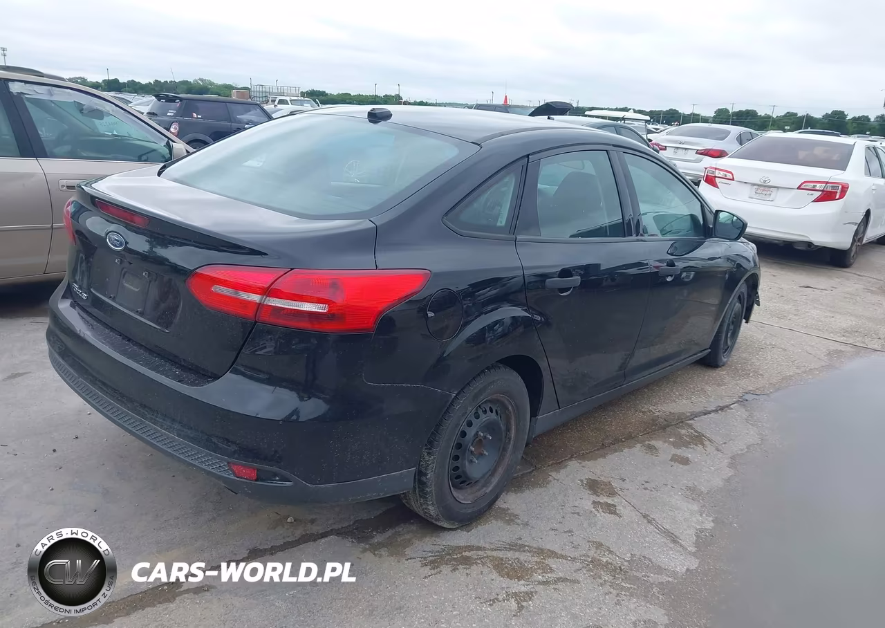 2017 Ford Focus S VIN:1FADP3E29HL234856 - 4