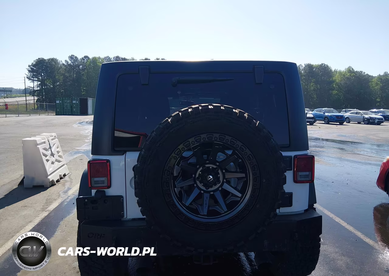 2014 Jeep Wrangler Unlimited Sport VIN:1C4HJWDG7EL139672 - 16