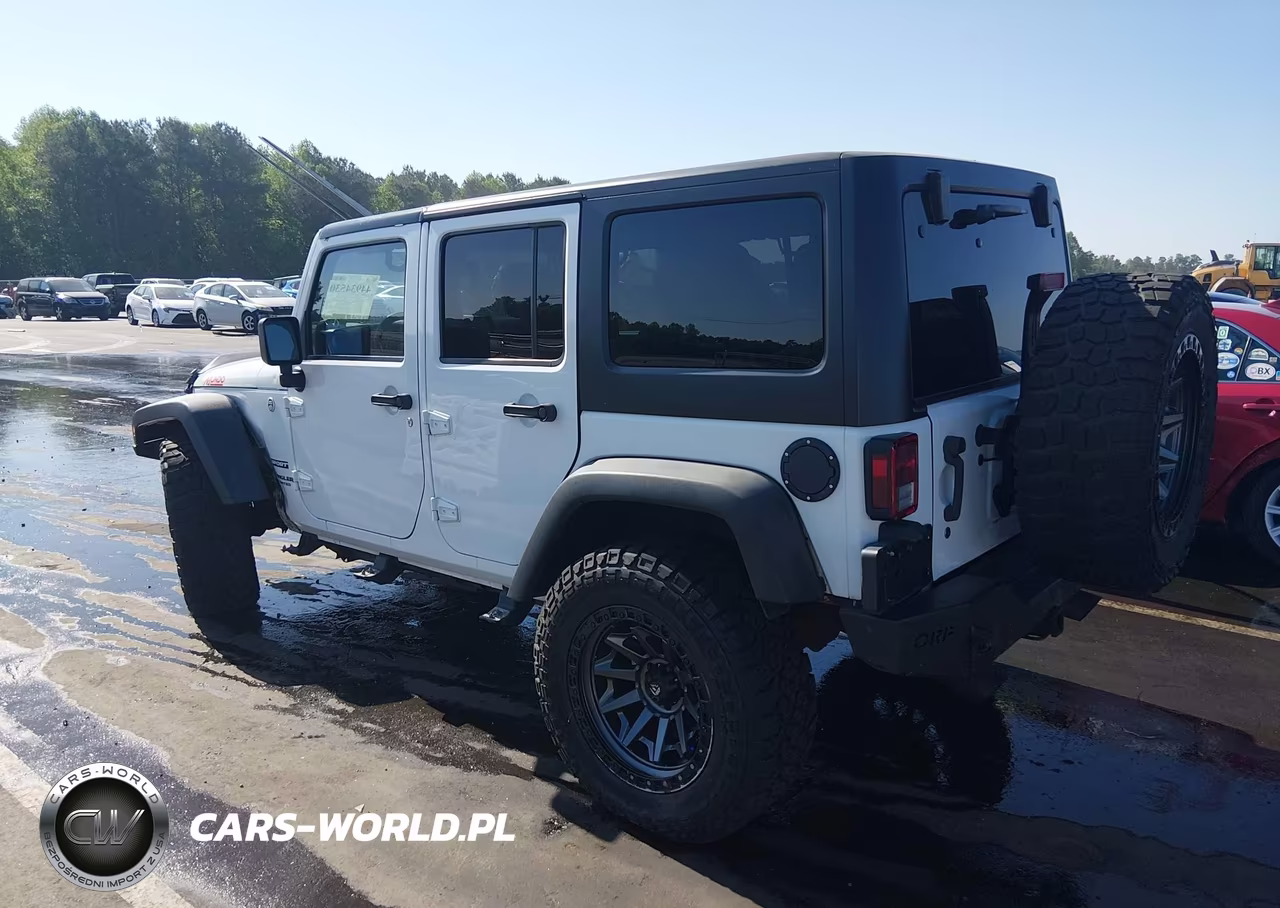 2014 Jeep Wrangler Unlimited Sport VIN:1C4HJWDG7EL139672 - 3