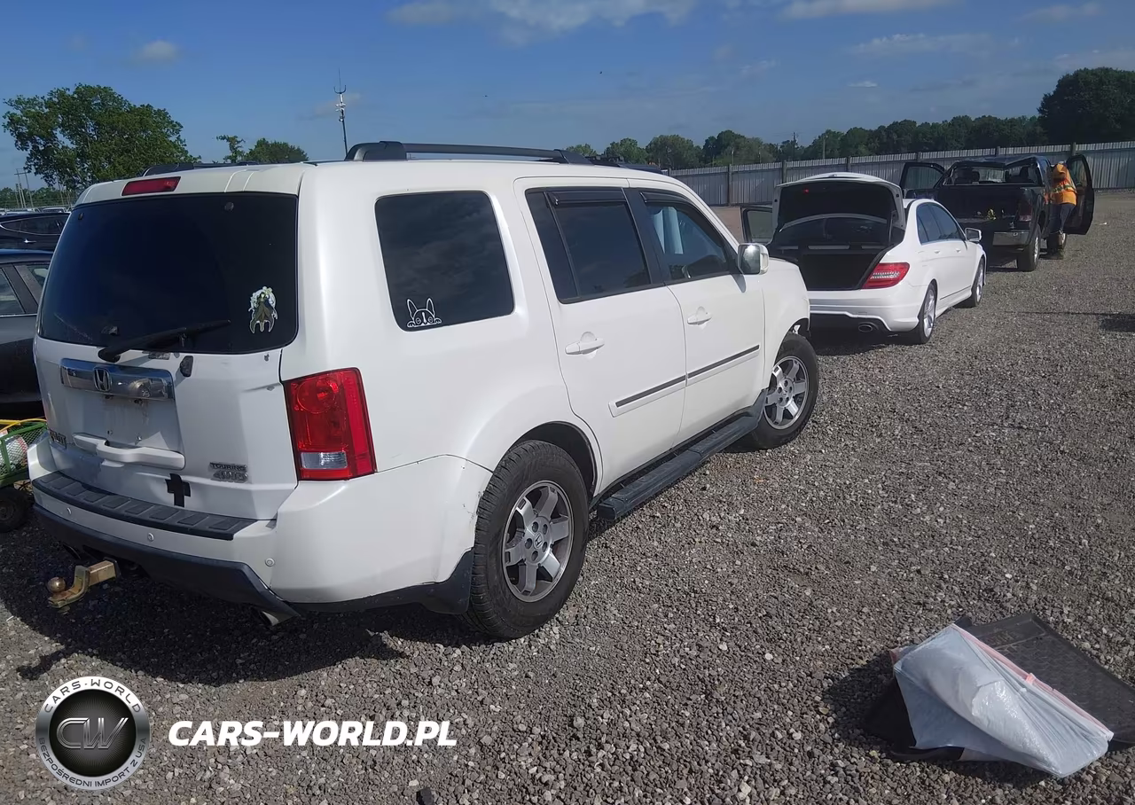 2011 Honda Pilot Touring VIN:5FNYF4H96BB063412 - 4