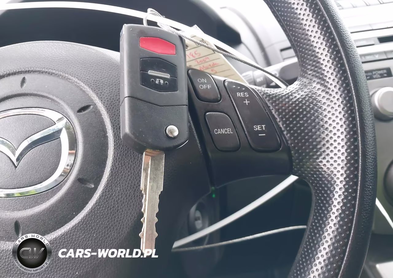 2009 Mazda Mazda5 Sport VIN:JM1CR293190358815 - 11