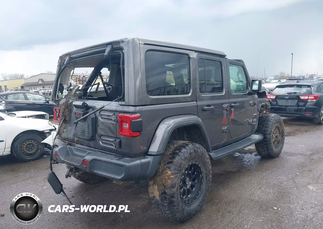 2019 Jeep Wrangler Unlimited Sahara 4X4 VIN:1C4HJXEG7KW568549 - 4