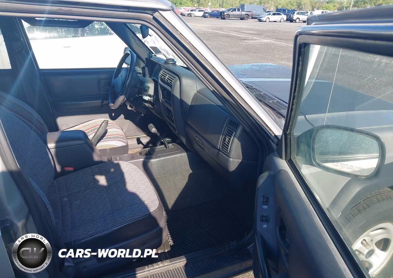 2000 Jeep Cherokee Sport VIN:1J4FF48S9YL114217 - 5