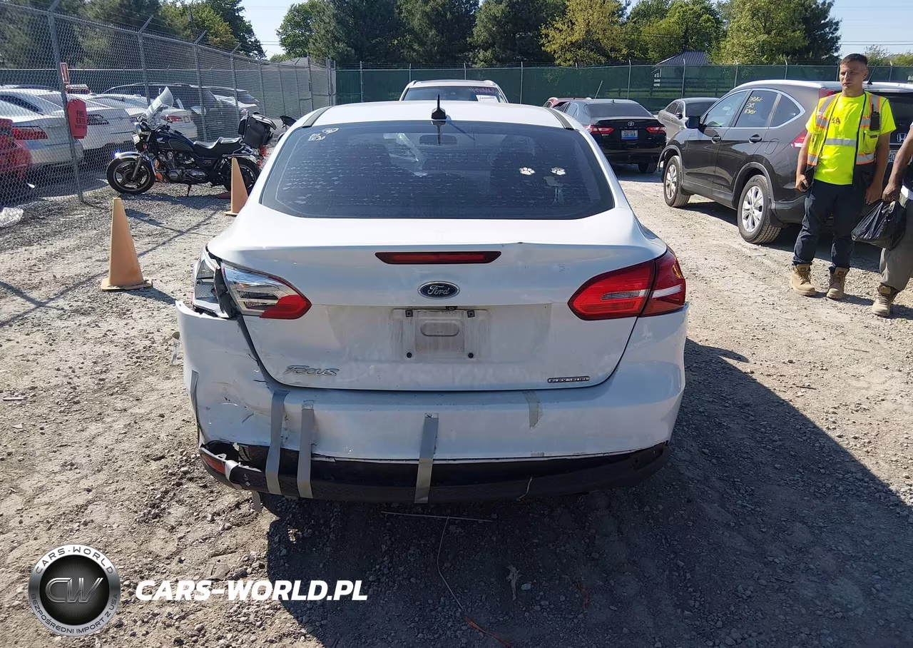 2015 Ford Focus S VIN:1FADP3E28FL217947 - 16