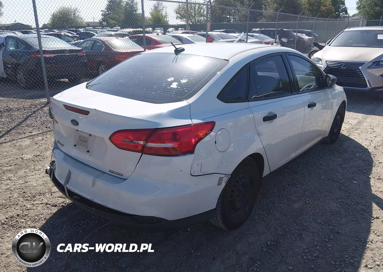 2015 Ford Focus S VIN:1FADP3E28FL217947 - 4