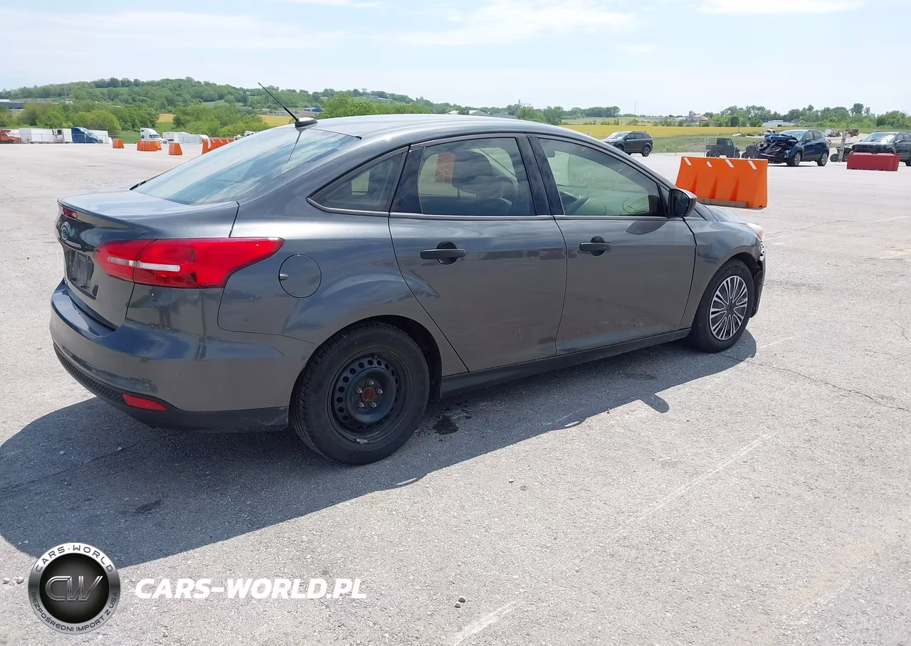 2017 Ford Focus S VIN:1FADP3E22HL205411 - 4