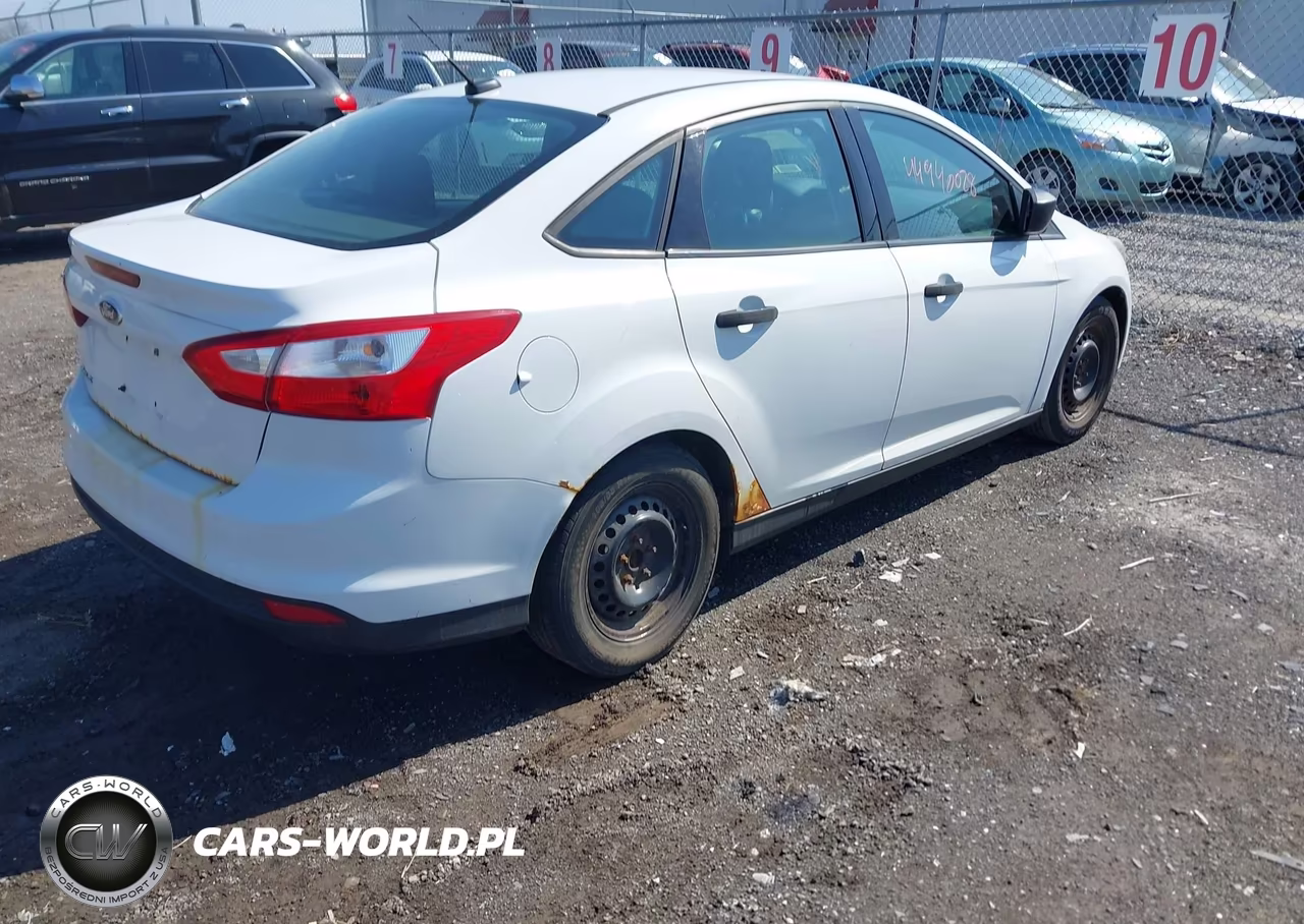 2014 Ford Focus S VIN:1FADP3E25EL255957 - 4