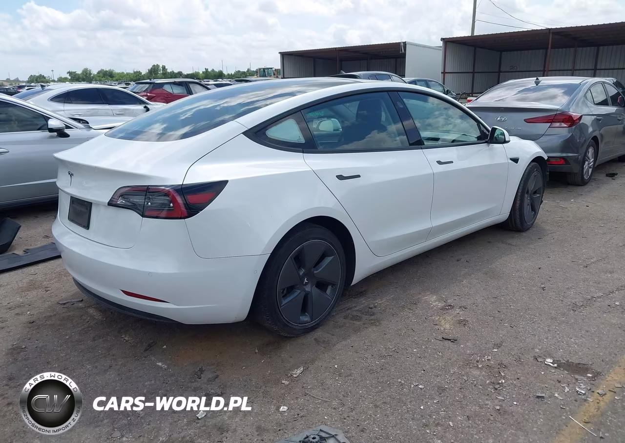 2021 Tesla Model 3 Standard Range Plus Rear-Wheel Drive VIN:5YJ3E1EAXMF100457 - 4