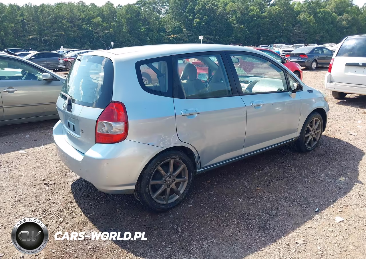 2007 Honda Fit VIN:JHMGD37467S059810 - 4