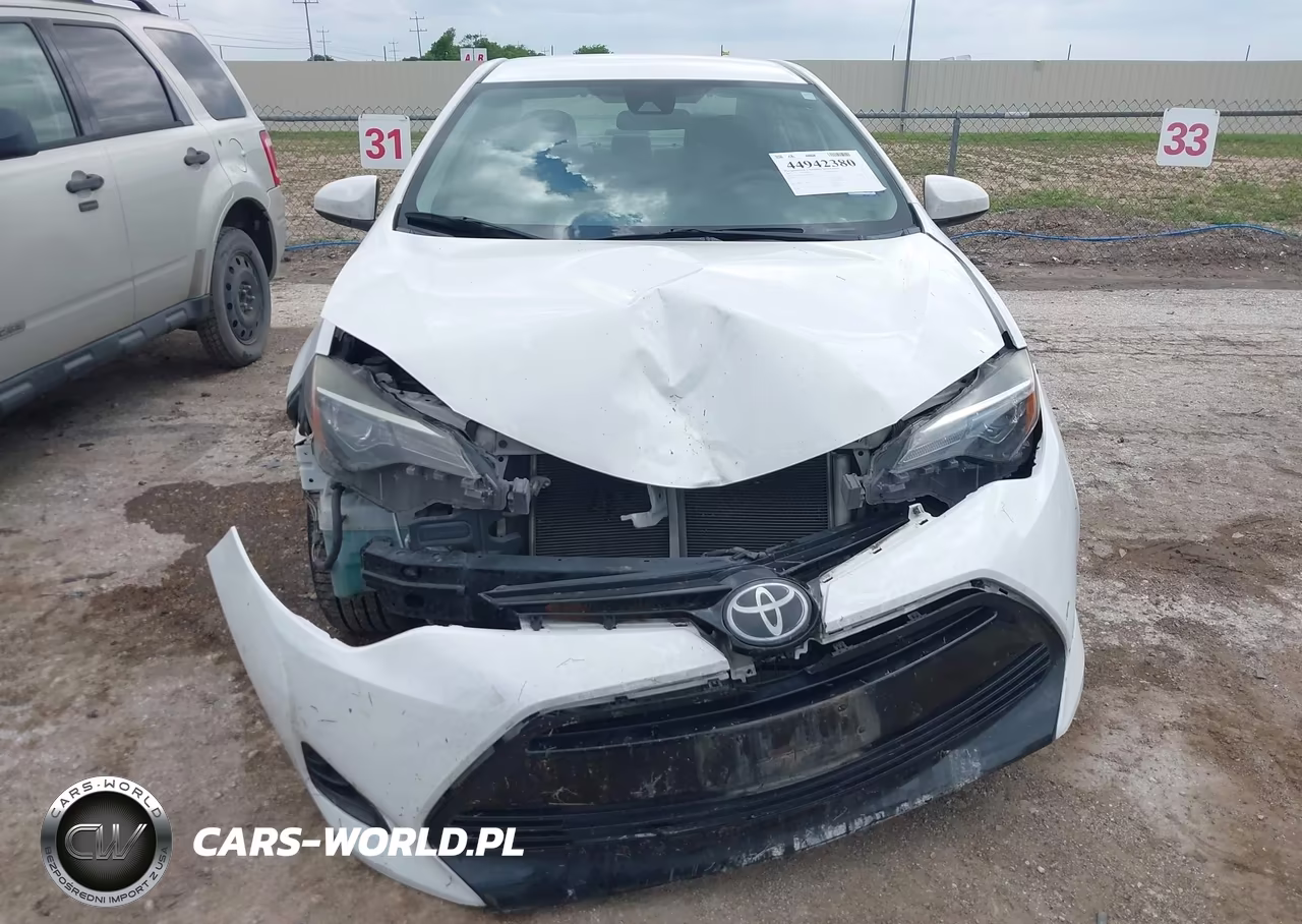 2017 Toyota Corolla Le VIN:5YFBURHE9HP684579 - 12