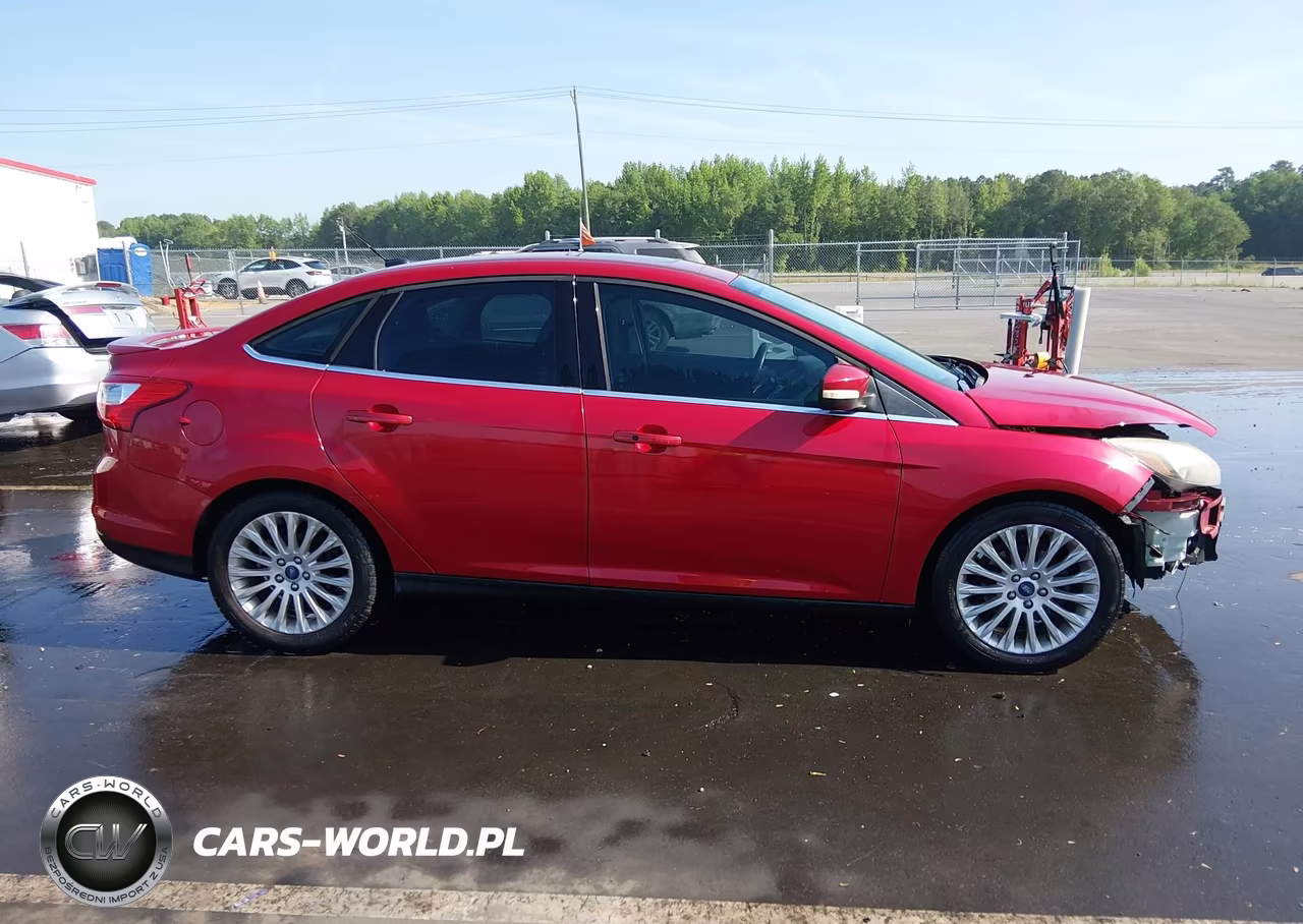 2012 Ford Focus Titanium VIN:1FAHP3J28CL461715 - 14