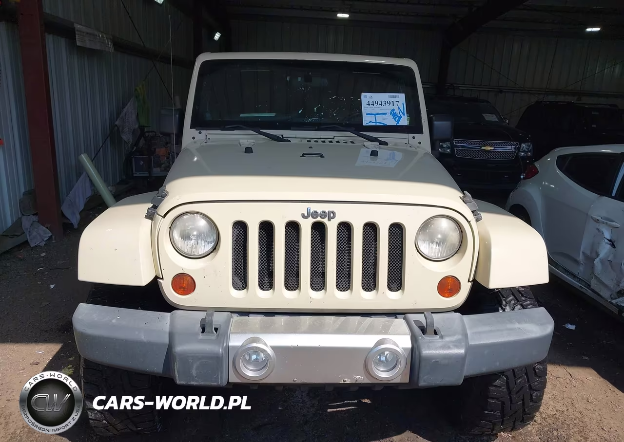2012 Jeep Wrangler Unlimited Sahara VIN:1C4BJWEG1CL104000 - 12