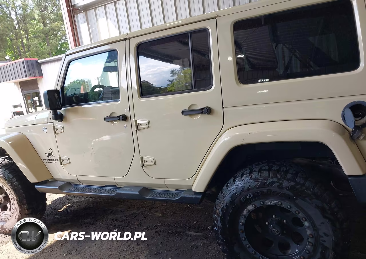 2012 Jeep Wrangler Unlimited Sahara VIN:1C4BJWEG1CL104000 - 14