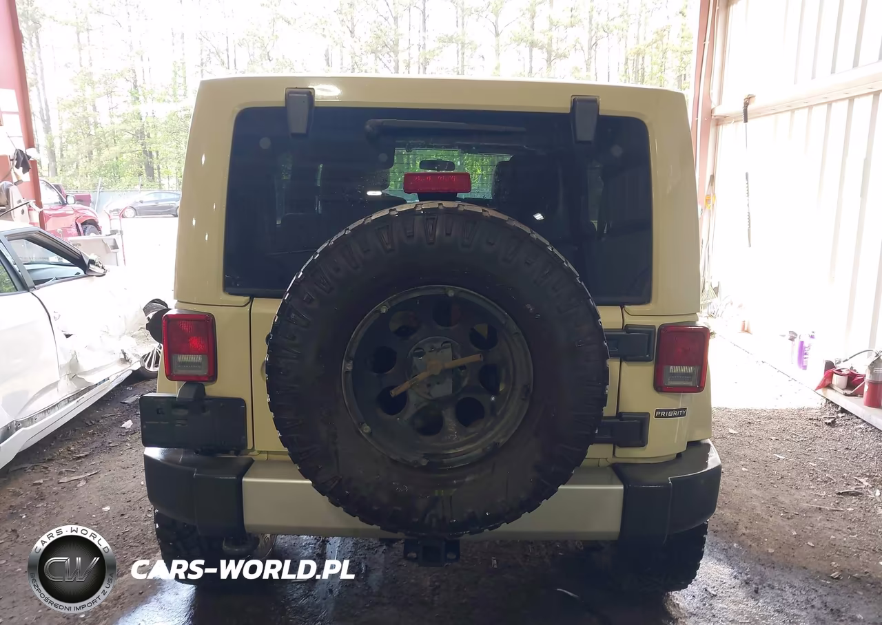 2012 Jeep Wrangler Unlimited Sahara VIN:1C4BJWEG1CL104000 - 16
