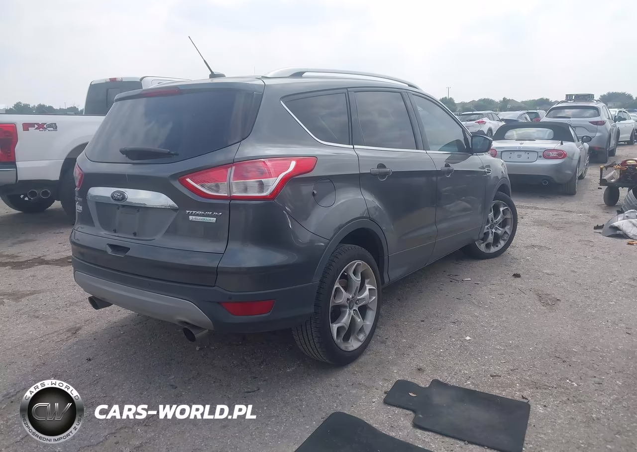 2015 Ford Escape Titanium VIN:1FMCU0J9XFUB39595 - 4