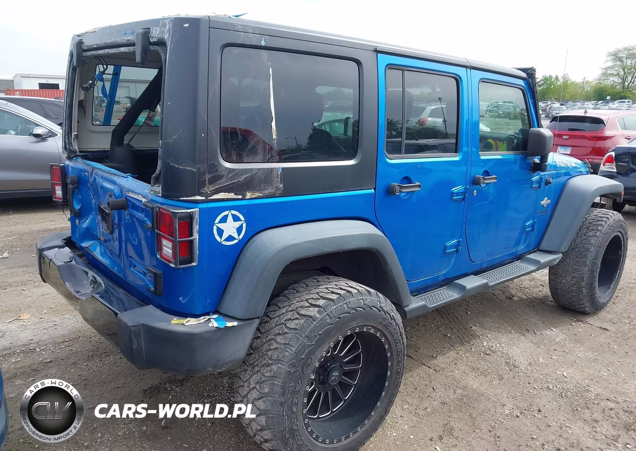 2014 Jeep Wrangler Unlimited Freedom Edition VIN:1C4BJWDG2EL196612 - 4