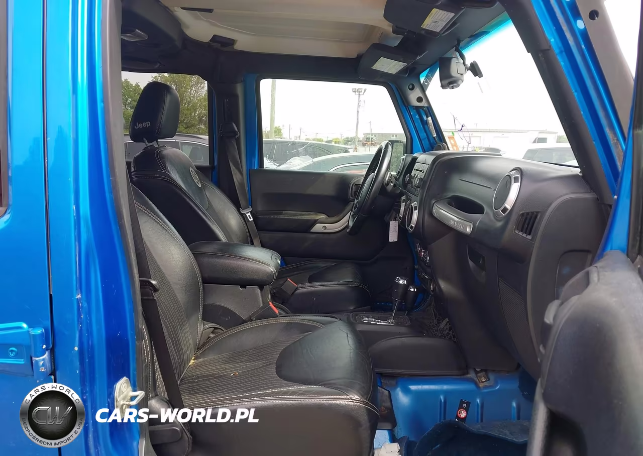 2014 Jeep Wrangler Unlimited Freedom Edition VIN:1C4BJWDG2EL196612 - 5