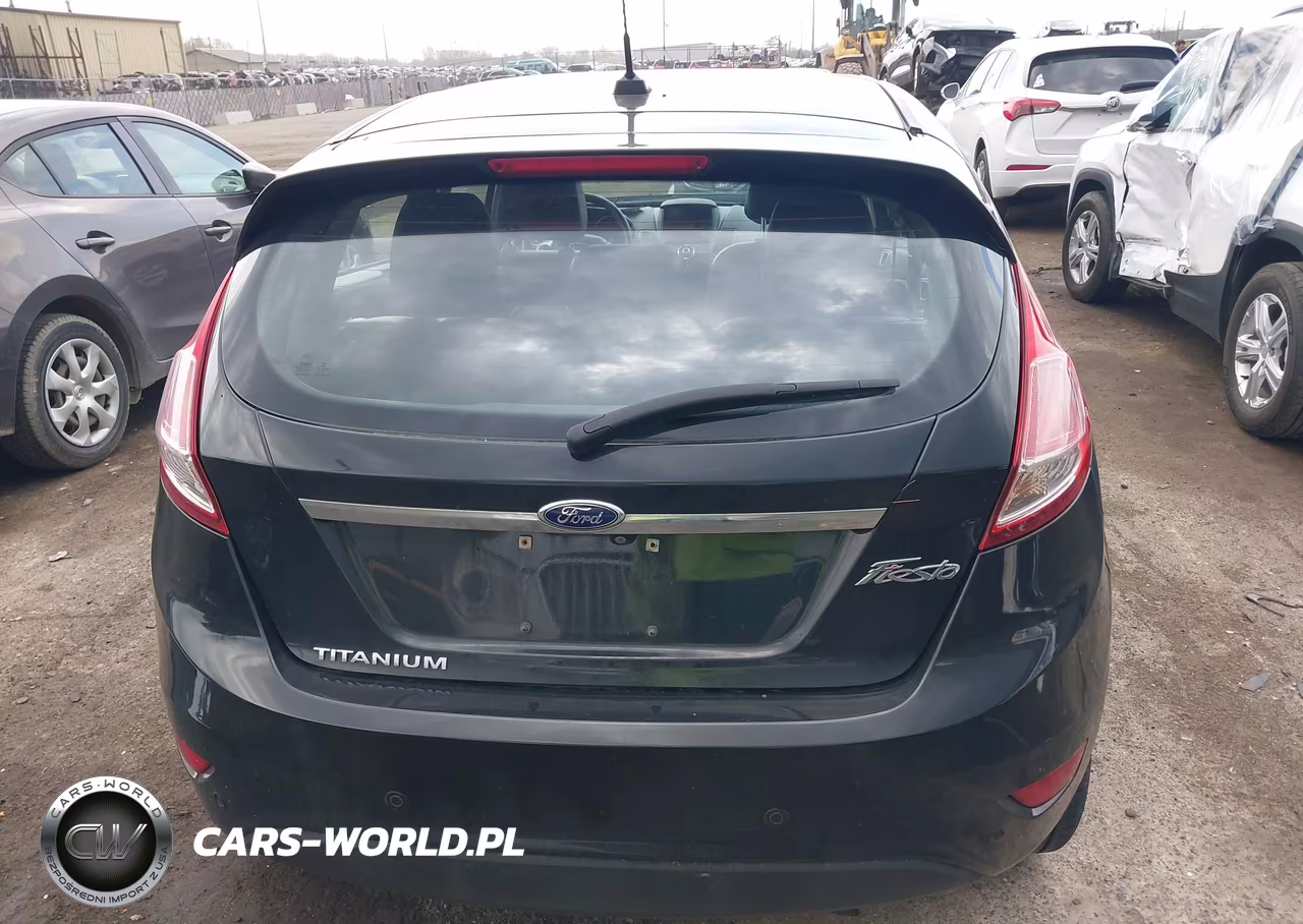 2014 Ford Fiesta Titanium VIN:3FADP4FJ4EM199973 - 16
