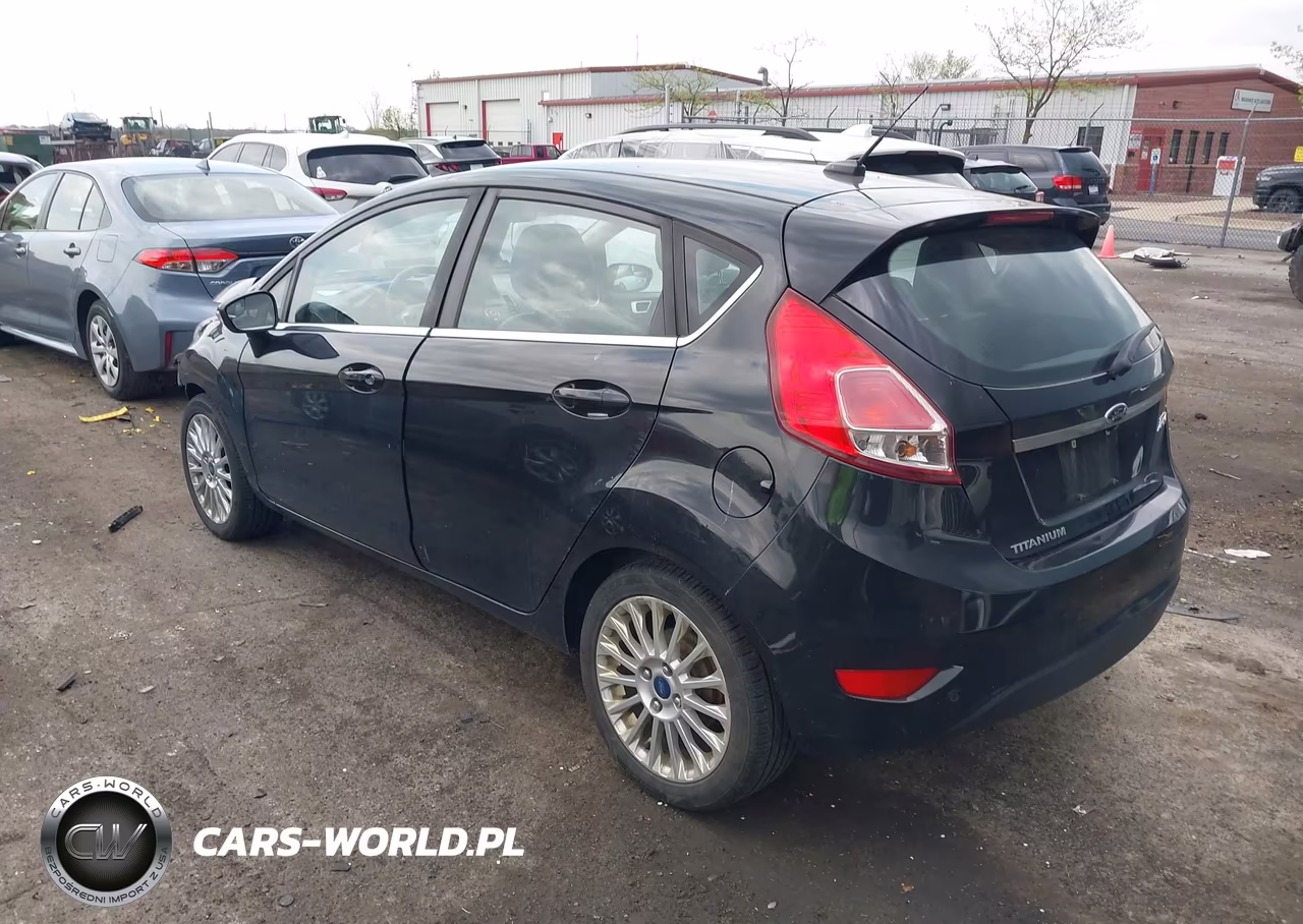 2014 Ford Fiesta Titanium VIN:3FADP4FJ4EM199973 - 3