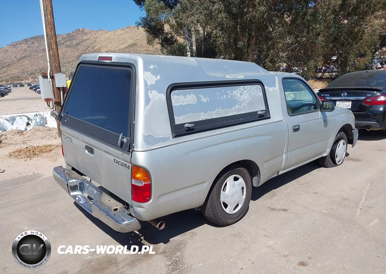 2000 Toyota Tacoma VIN:5TENL42N0YZ713733 - 4