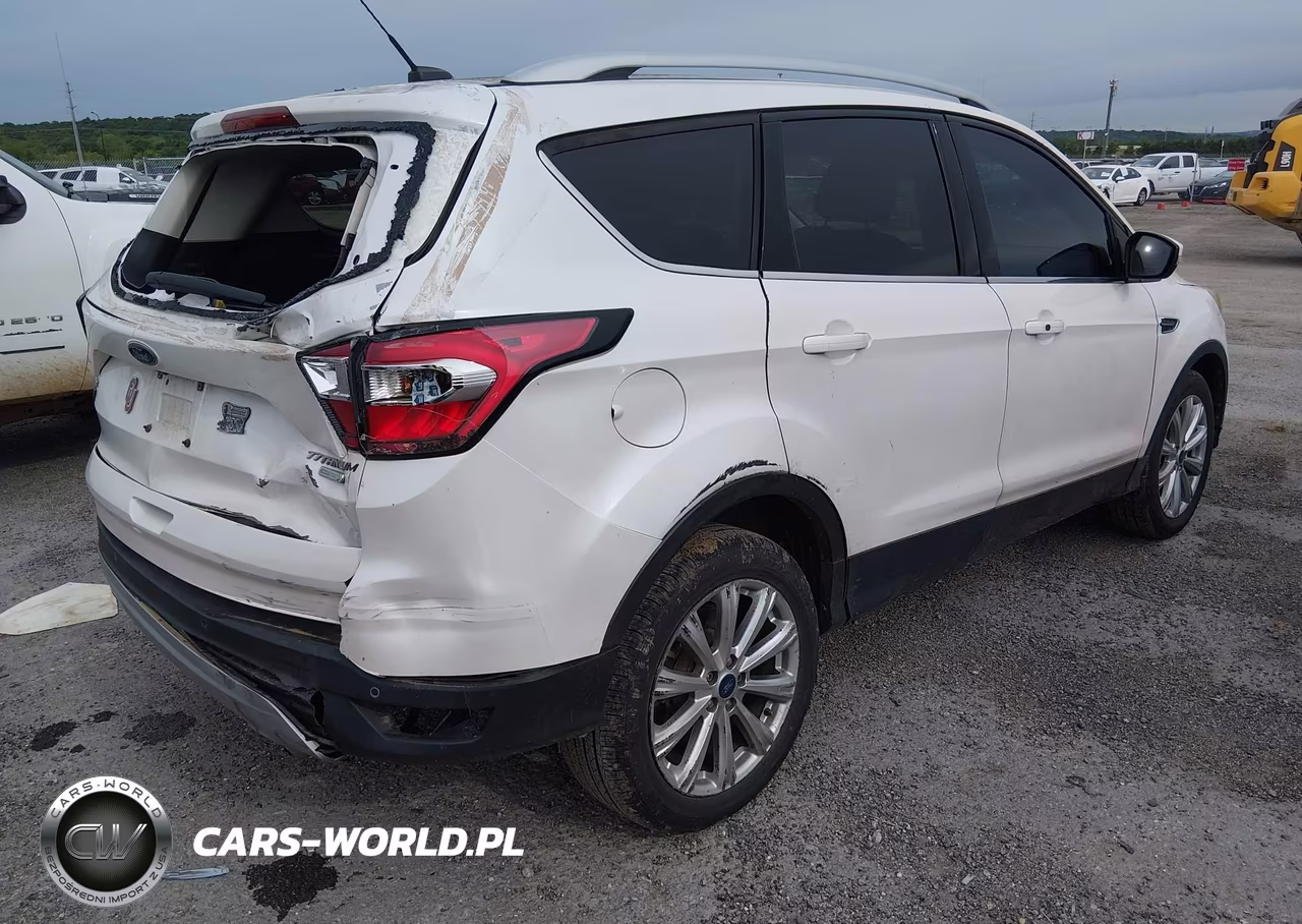2017 Ford Escape Titanium VIN:1FMCU0J97HUC49281 - 4