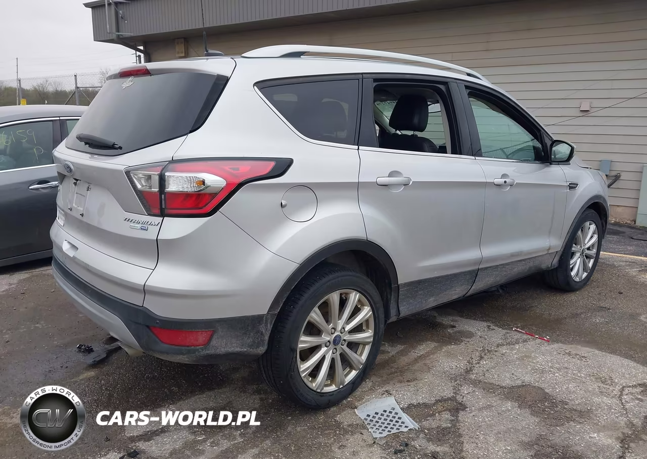 2017 Ford Escape Titanium VIN:1FMCU9J9XHUA96013 - 4