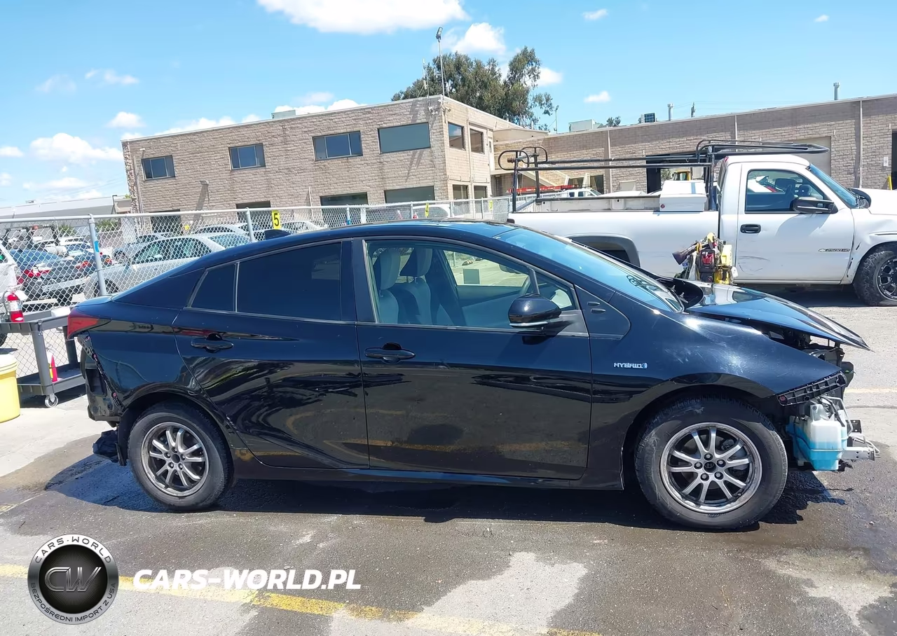 2021 Toyota Prius L Eco VIN:JTDKAMFU3M3134593 - 14