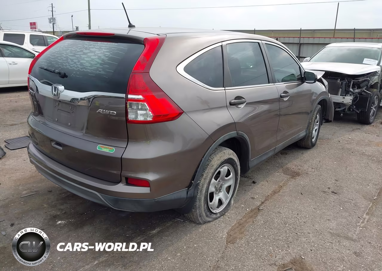 2015 Honda Cr-V Lx VIN:5J6RM4H39FL100651 - 4