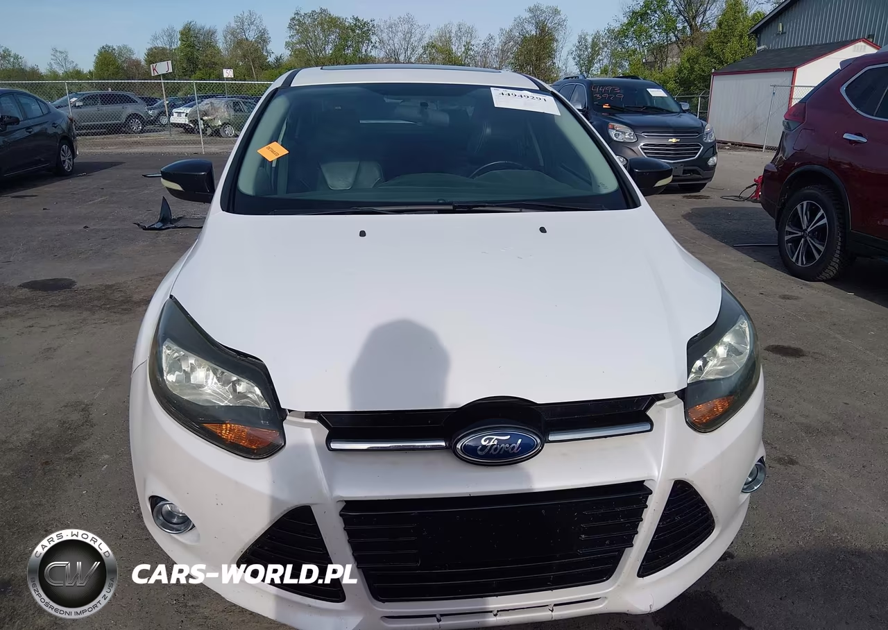 2014 Ford Focus Titanium VIN:1FADP3J2XEL389790 - 12