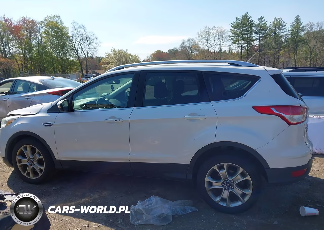 2016 Ford Escape Titanium VIN:1FMCU9J94GUB65101 - 14