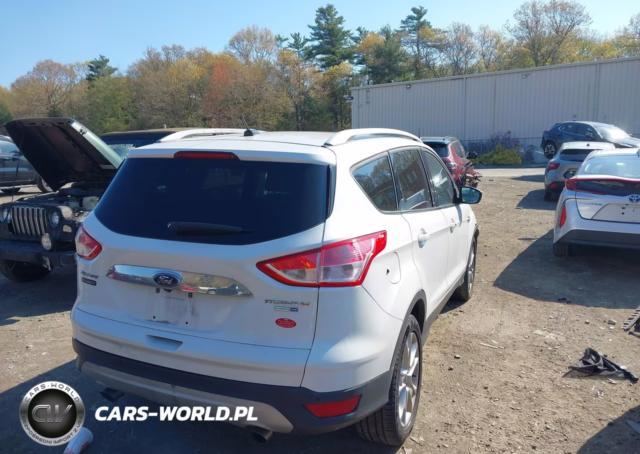 2016 Ford Escape Titanium VIN:1FMCU9J94GUB65101 - 4