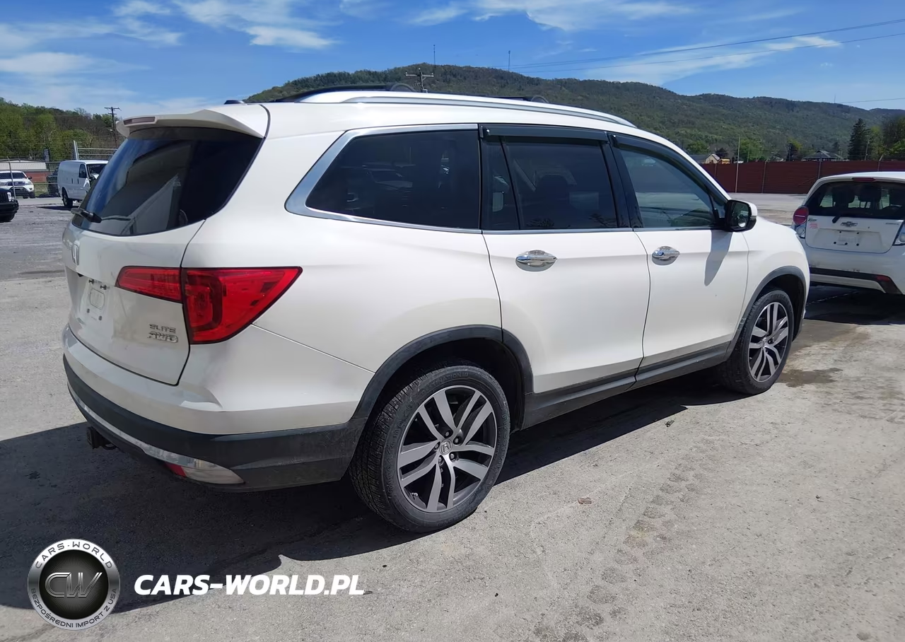 2016 Honda Pilot Elite VIN:5FNYF6H00GB042091 - 4