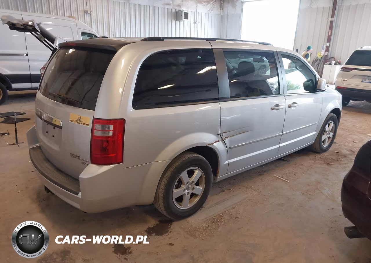 2010 Dodge Grand Caravan Sxt VIN:2D4RN5D15AR427399 - 4