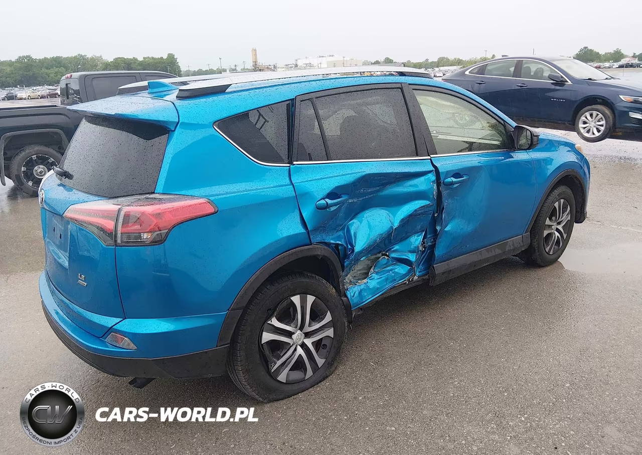 2018 Toyota Rav4 Le VIN:JTMBFREV7JD242360 - 4