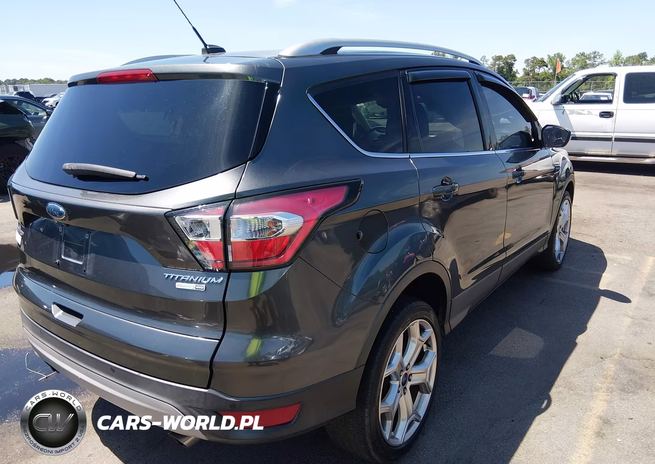 2017 Ford Escape Titanium VIN:1FMCU9J95HUF01677 - 4