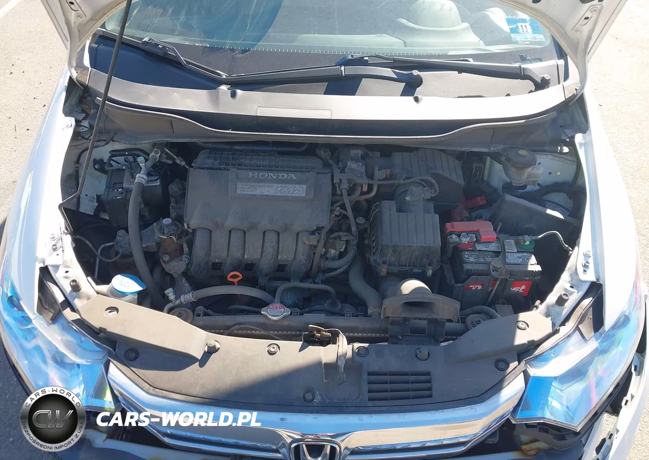 2014 Honda Insight Lx VIN:JHMZE2H56ES002110 - 10