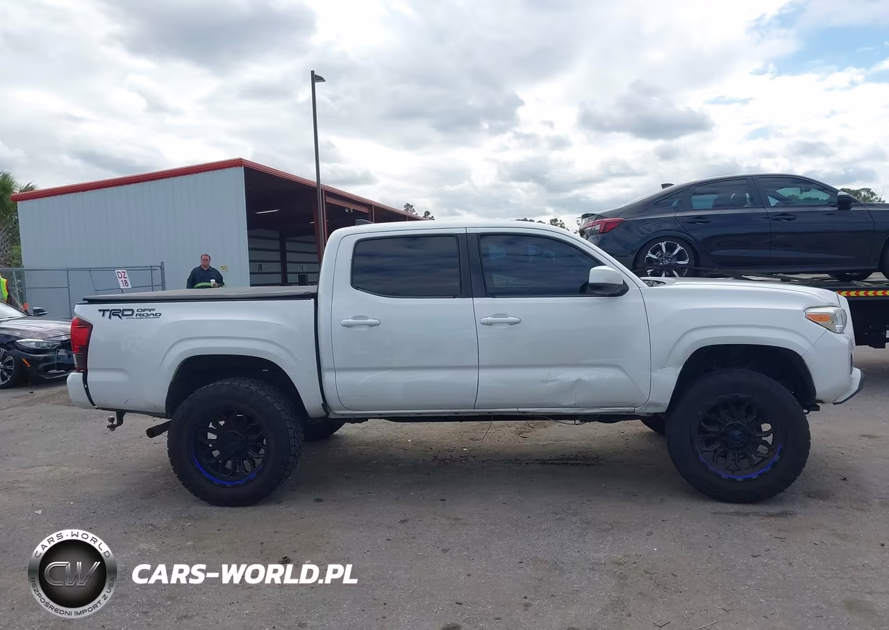 2018 Toyota Tacoma Sr VIN:5TFAX5GN5JX131805 - 13