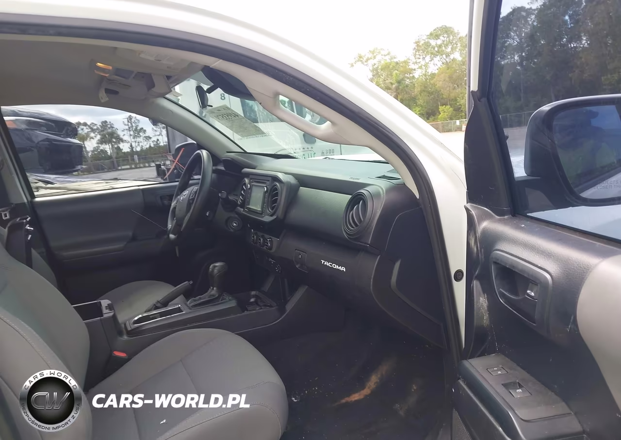 2018 Toyota Tacoma Sr VIN:5TFAX5GN5JX131805 - 5