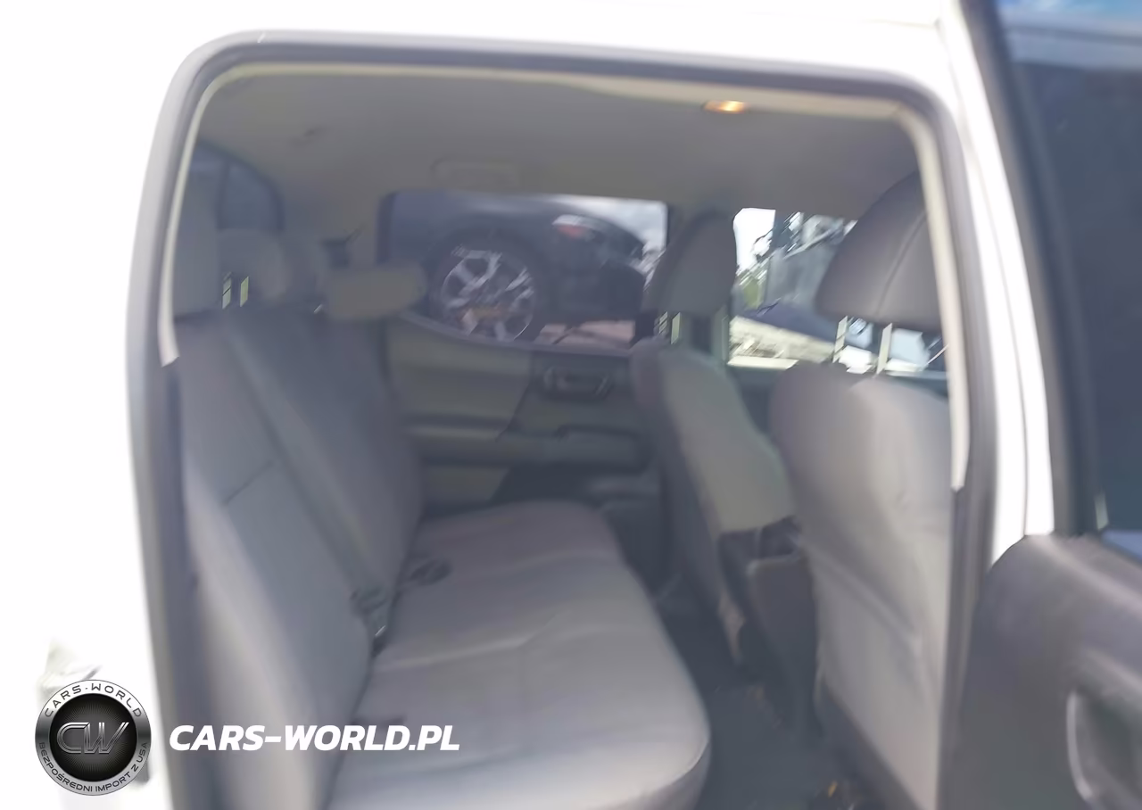 2018 Toyota Tacoma Sr VIN:5TFAX5GN5JX131805 - 8