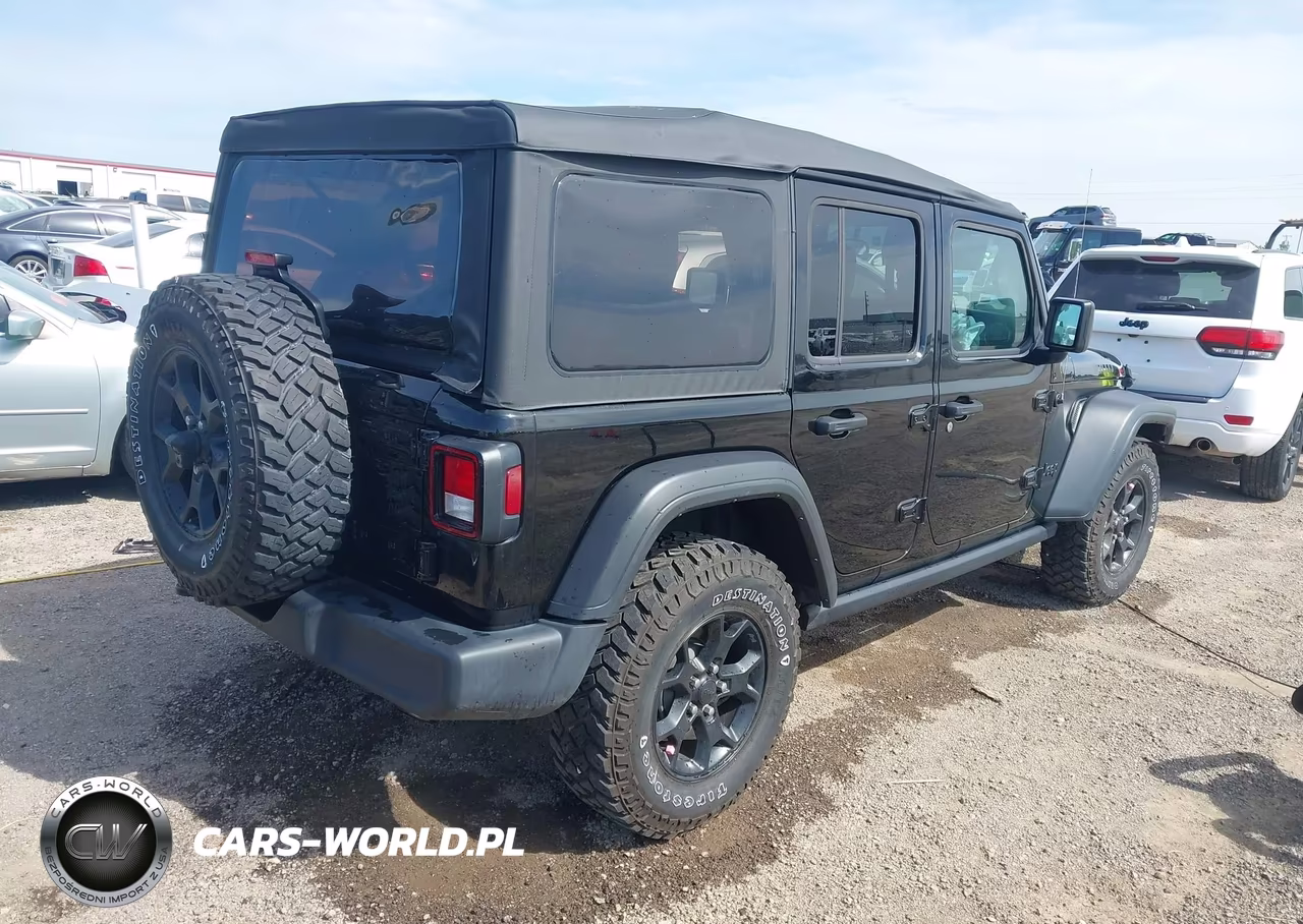 2023 Jeep Wrangler 4-Door Willys 4X4 VIN:1C4HJXDNXPW543524 - 4