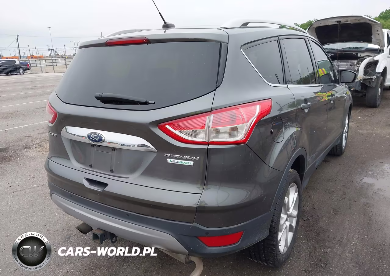 2015 Ford Escape Titanium VIN:1FMCU0J99FUC59744 - 4