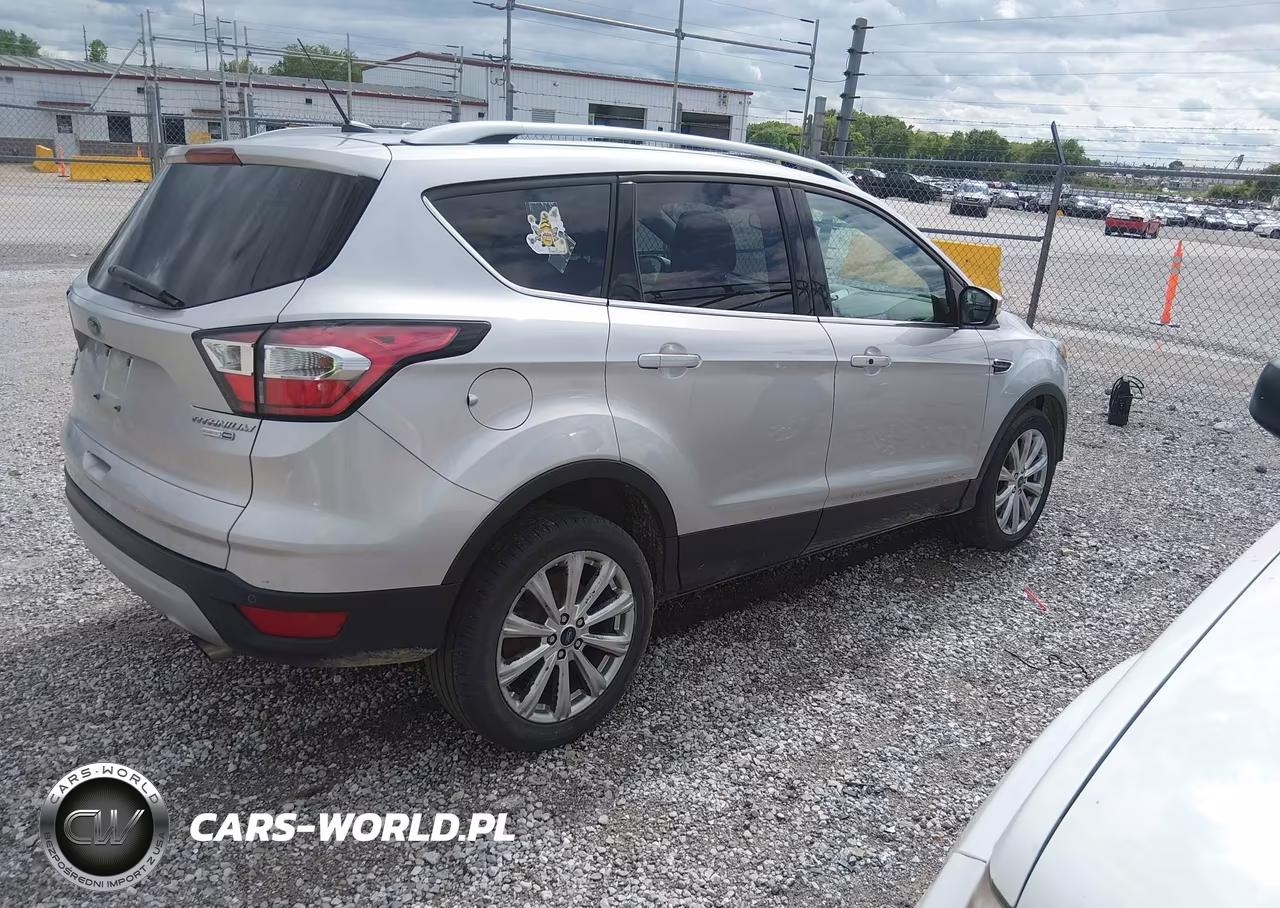 2017 Ford Escape Titanium VIN:1FMCU9JD9HUE34229 - 4