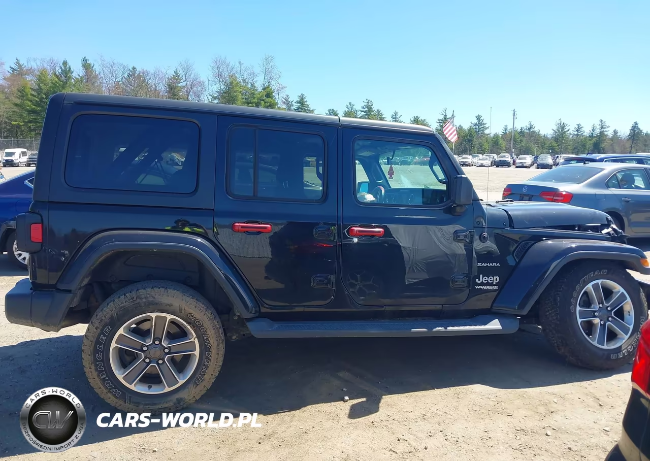2019 Jeep Wrangler Unlimited Sahara 4X4 VIN:1C4HJXEN0KW509888 - 14