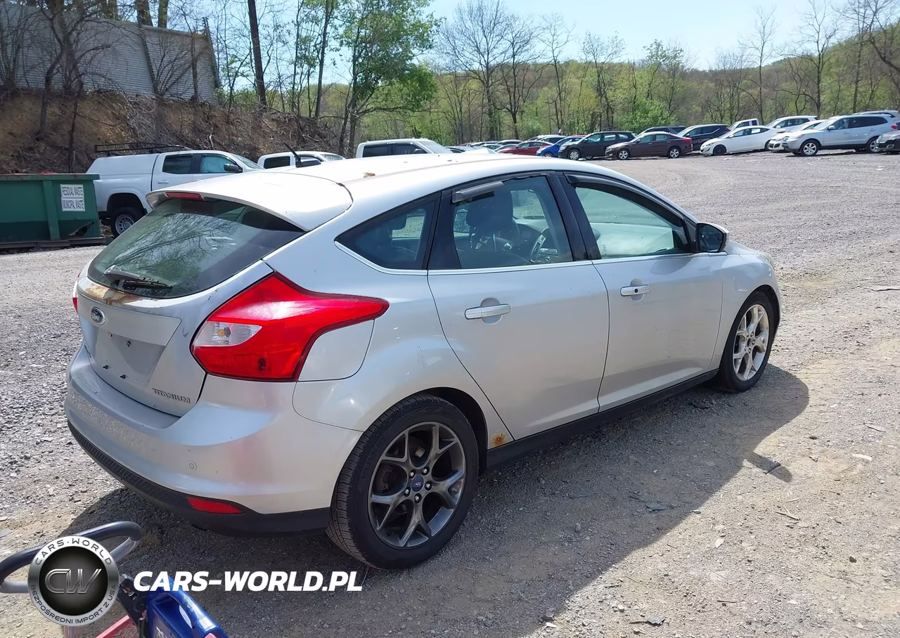 2012 Ford Focus Titanium VIN:1FAHP3N20CL102501 - 4