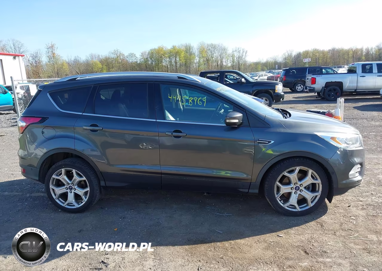 2017 Ford Escape Titanium VIN:1FMCU9J9XHUE29813 - 13