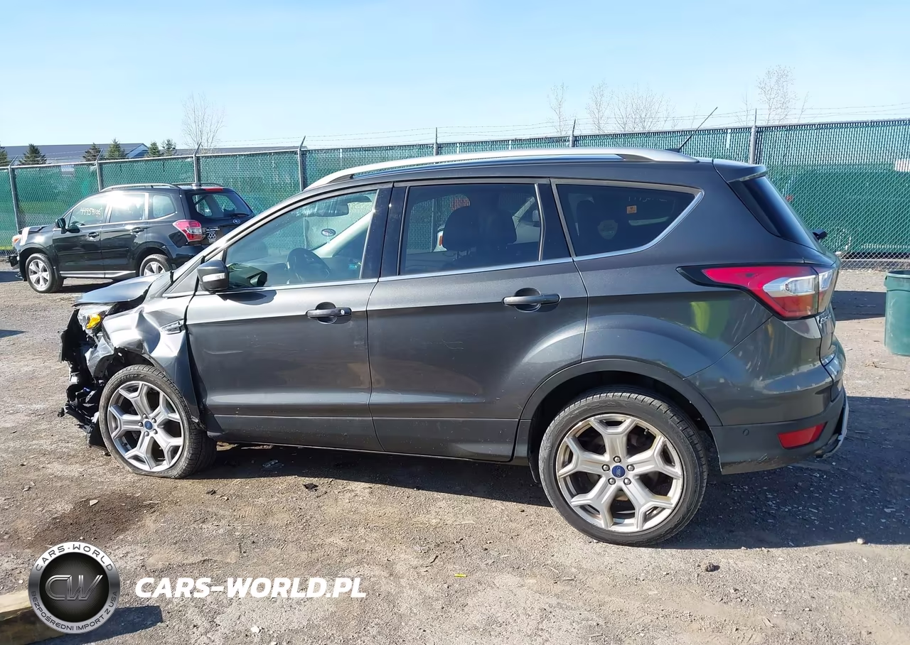 2017 Ford Escape Titanium VIN:1FMCU9J9XHUE29813 - 14