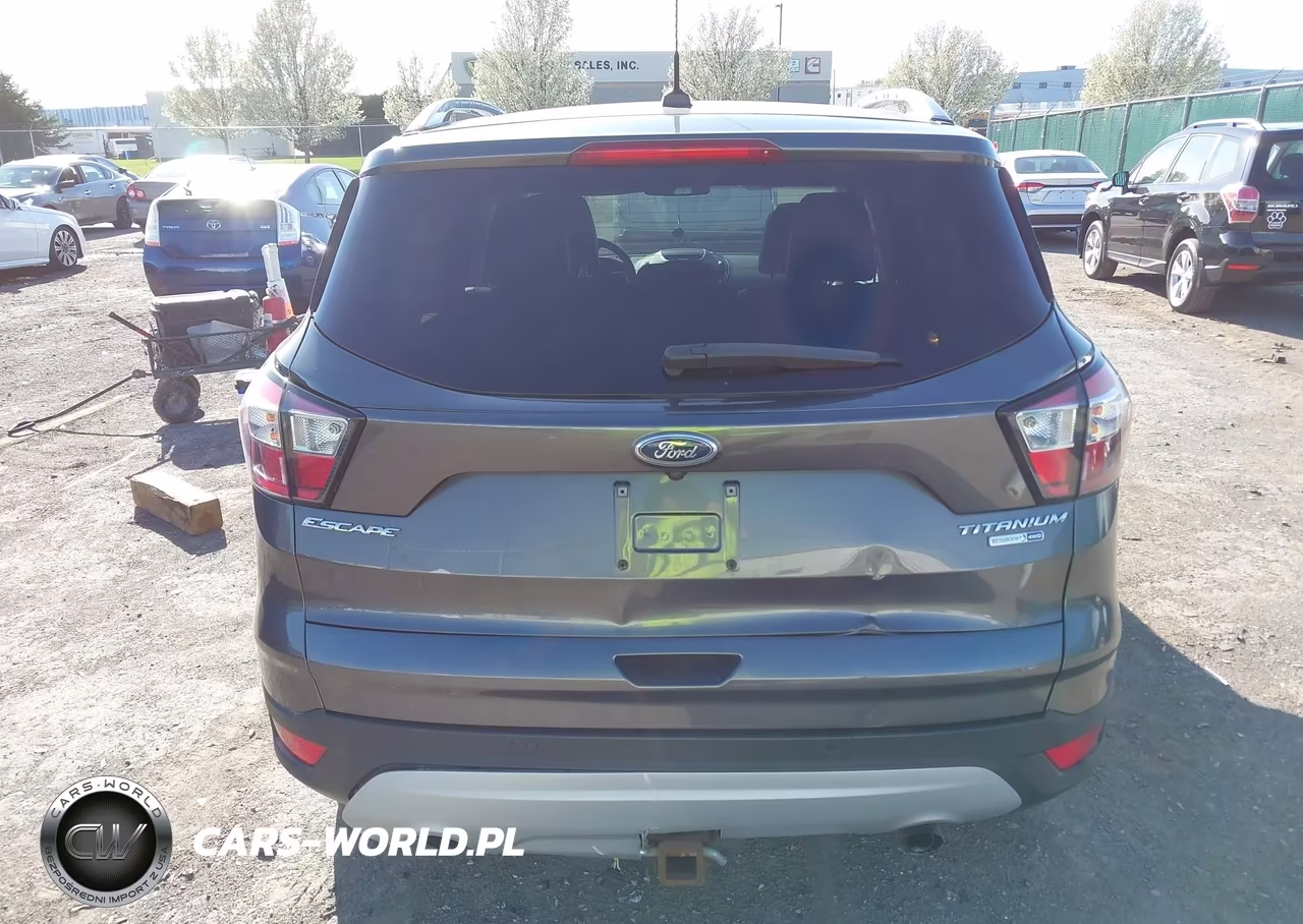 2017 Ford Escape Titanium VIN:1FMCU9J9XHUE29813 - 16