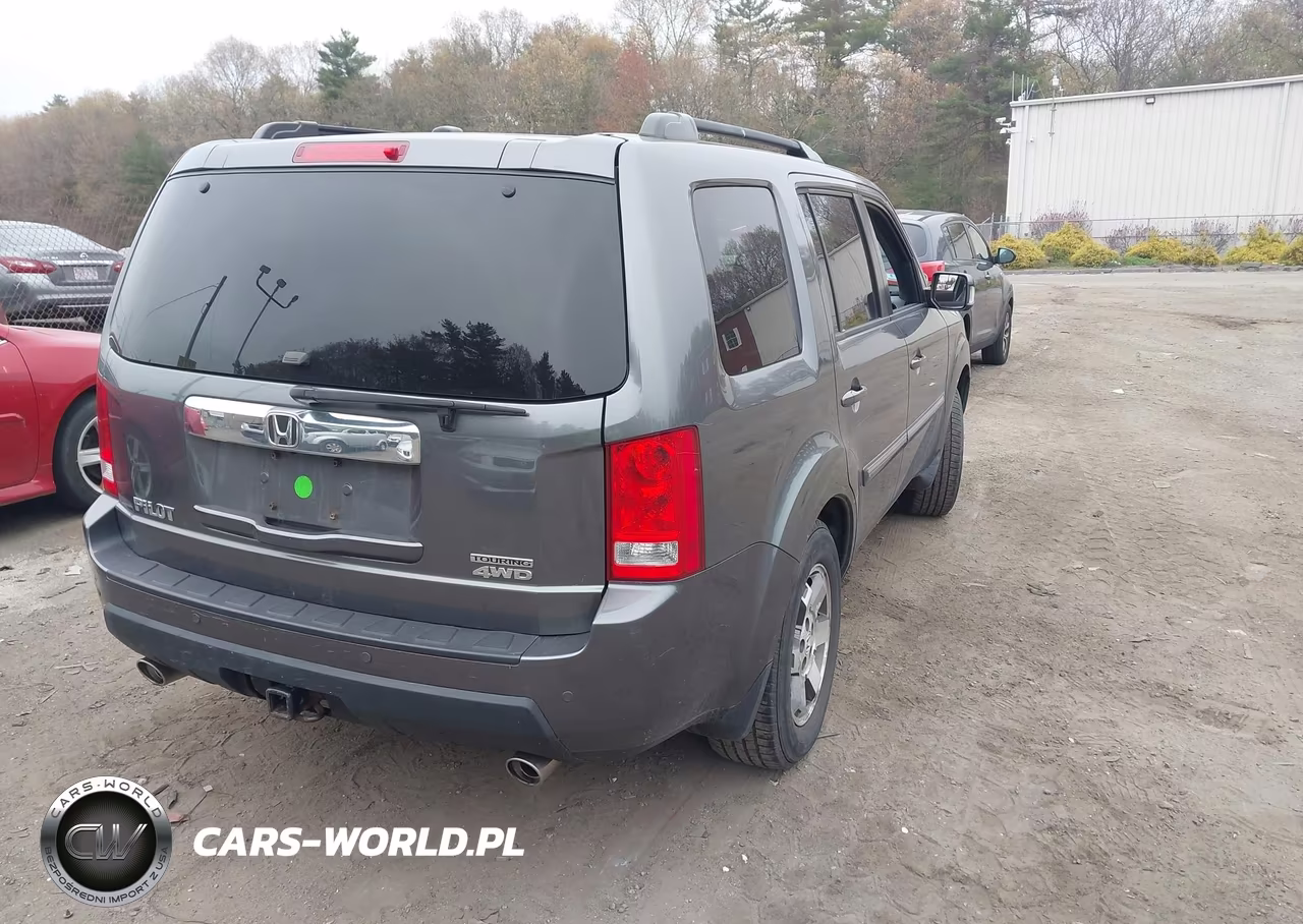 2011 Honda Pilot Touring VIN:5FNYF4H94BB061254 - 4