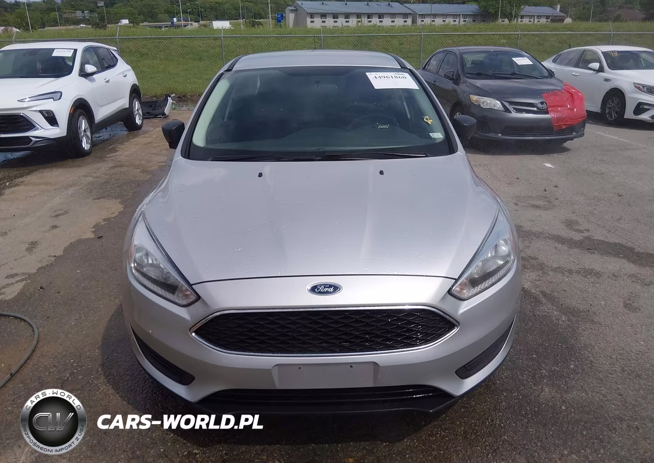 2015 Ford Focus S VIN:1FADP3E20FL357233 - 12